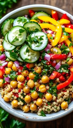 a white bowl filled with vegetables and grains