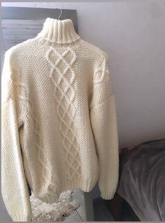 Handmade knitted sweater with a high neck.  The color is «milky», also the sweater can be any color of your choice.   Soft wool does not bite the body.   I will create this sweater in the size you need.  Lead time: 10 days Handmade Sweater For Men, Winter White Funnel Neck Sweater For Winter, Winter White High Neck Sweater For Winter, High Neck Winter White Sweater, Cream High Neck Sweater For Winter, Cream Turtleneck Knit Cardigan, Classic White Funnel Neck Sweater, Winter White High Neck Sweater, Classic Knitted Winter Turtleneck