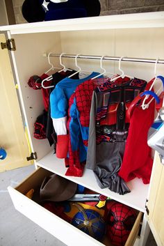 the closet is filled with spider - man shirts and other items to be packed into