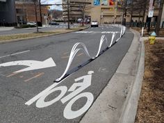 a bike lane with an arrow pointing to the right