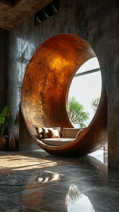 a large circular wooden chair sitting on top of a marble floor next to a window