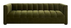 a green velvet couch with black legs