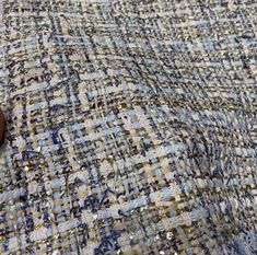 This blue tweed boucle fabric has a lovely stripe design made with yarns and ribbons in vivid colors. Turn this his French tweed boucle into a fancy jacket or dress in a unique style. Width: 150cm = 59inches Weight: 870g/m² ❤ The listing is for selling per yard, for more quantity, we will send you an uncut piece. Such as, quantity 2= 1 piece of 2 yards, quantity 5 = 1 piece of 5 yards. etc. If purchase more, please feel free to contact us for a wholesale price❤ Disclaimer of Photos: The photo may differ from the actual product due to reproduction limitations of the photograph and limitations of viewing photos at different resolutions, hue, brightness, contrast, and other screen variations. Due to these limitations, photos may not provide a perfect match to the actual product received. Plea Blue Tweed, Suit Coat, Boucle Fabric, Tweed Fabric, Chanel Fashion, Suits Coats, Cool Fabric, Luxury Fabrics, Coat Dress