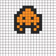 an orange and black cross stitched pattern with squares in the shape of a mushroom