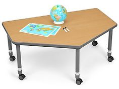 a desk with wheels and a globe on top