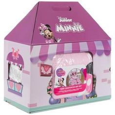 the minnie mouse toy is in its pink and white box with decorations on it's side