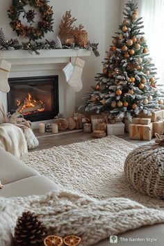 a living room with a christmas tree and fireplace