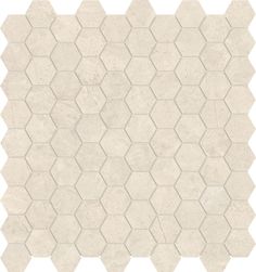 a white tile pattern with hexagonal tiles in the shape of hexagons