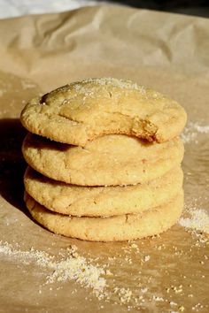 a stack of cookies sitting on top of a piece of wax paper