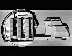 black and white photograph of an architectural model with multiple sections in the shape of buildings