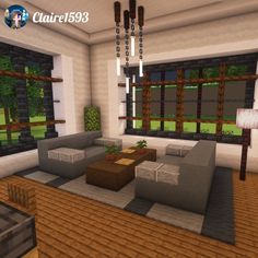 a living room filled with furniture and lots of windows