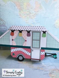 a paper model of a food truck on a map with the words simply crafty