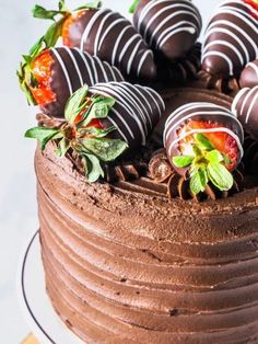 a chocolate cake with strawberries on top