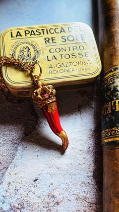 "Cornicello brings good luck unique in its kind because it is made entirely by hand giving its imperfect shape, as required by Neapolitan popular tradition. His design is in Bourbon style with a golden metal crown decorated with patina and gold leaf. The horn is made of ceramic and resin, it is hand painted with carmine red pigment and embellished with golden foil on the tip and in some parts of the horn based on inspiration. Its length is approximately 5/5.5cm/1.96\"/2.16 inches, but since each horn is handmade, the measurement is sometimes inaccurate, so please take this into consideration before ordering. The chain is golden steel, fine and simple with a length of 30cm/11.81 inches. It turns out to be a beautiful gift to give because it is designed by the artist based on the inspiration Antique Red Jewelry For Gifts, Symbolic Red Pendant Necklace, Red Engraved Amulet Necklace, Handmade Vintage Necklace For Good Luck, Artisan Red Collectible Necklaces, Antique Red Handmade Necklace, Antique Red Handmade Necklaces, Artisan Red Necklace For Gift, Handmade Red Necklaces For Collectors