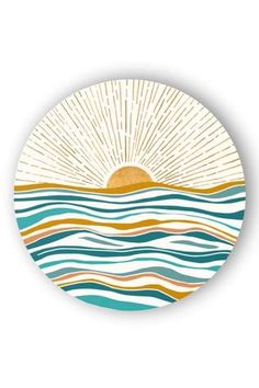 a plate with an image of the sun over water