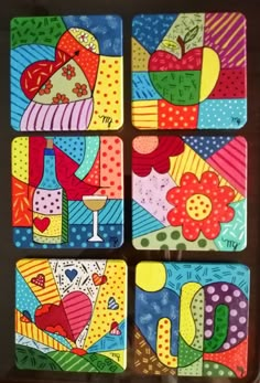 four coasters with colorful designs on them