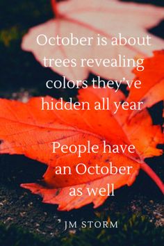 an orange leaf laying on the ground with a quote from jm storm about trees revealing colors they've hidden all year people have an october as well