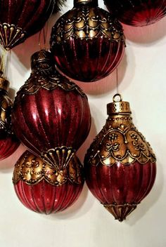 red and gold ornaments hanging from the ceiling