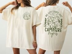 No City Lights Just Campfire Nights Shirt, Campfire Shirt, Family Adventure, Camp Lover Gift, Family Camping, Camping Gift  Heather colors are 52% combed and ring-spun cotton, 48% polyester - Athletic and Black Heather are 90% combed and ring-spun cotton, 10% polyester - Solid Colors 100% pre-shrunk cotton - Fiber content may vary by color FOR THE BEST FIT; (See Size Chart in Images). 1) Lay a t-shirt on a flat surface. 2) Measure the chest area, just under the armpit from side to side find the Adventure Camp, Camping Gifts, Family Camping, Family Adventure, Color Charts, Night Shirt, Flat Surface, City Lights, Campfire