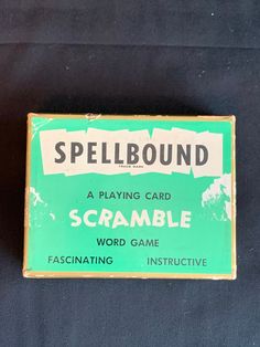 an old spellbound card game is displayed on a black tablecloth with the words spellbound