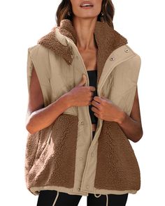 PRICES MAY VARY. Fuzzy Fleece and Nylon Piecing Vest: Fleece vest incorporates nylon piecing to enhance durability, combined with a soft and sherpa fuzzy texture that keeps you warm and stylish, you'll turn heads wherever you go Features: Oversized padded vest, color block design, zippered pockets with knit tape pullers, snap button closures, loose fit, sleeveless, quilted vest women, utility vest for women Versatile Design: The sherpa vest comes with a removable hood and stand collar, adjustabl Womens Sherpa, Padded Vest, Vest For Women, Sherpa Vest, Utility Vest, Thick Sweaters, Outerwear Vest, Quilted Vest, Fleece Vest