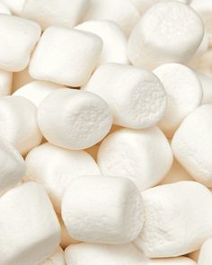 white marshmallows are scattered on top of each other