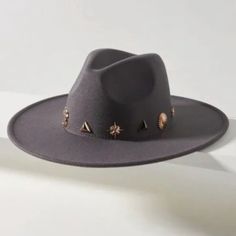 Trimmed With A Collection Of Gilded Charms, This Topper Infuses Seasonal Ensembles With Plenty Of Whimsical Flair. Wool Metal Trim Spot Clean Imported Dimensions Each Charm May Vary In Placement 23.5" Crown; 4" Brim Mer Fl Gray Wide Brim Felt Hat For Fall, Gray Fedora For Fall, Gray Brimmed Fedora For Fall, Fall Gray Fedora Hat, Fall Gray Fedora Felt Hat, Gray Adjustable Felt Hat For Fall, Adjustable Gray Felt Hat For Fall, Gray Curved Brim Hat For Fall, Rancher Hat