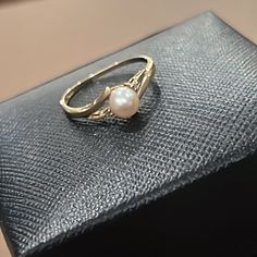 Vintage! Purchased In 1997 From Antique Store 10k Yellow Gold Single Iridescent Pearl Two Diamonds, One On Each Side Of The Pearl I’m A Size 4 And It Is Slightly Loose On Me So Between 4-5? (Pictured Next To My Wedding Band For Size, Which Is Not Included) Can Be Resized At Jewelers! Absolutely Gorgeous Piece! Comes With A Gray Box (That States 14k Gold On The Inside) That It Did Not Originally Come In (Last Picture) Add This To Your Jewelry Collection! Single Pearl Ring, Pearl Diamond Ring, Iridescent Pearl, Pearl And Diamond Ring, Antique Store, Pearl Diamond, The Pearl, Antique Stores, Gold Pearl