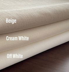 three different types of fabric on top of each other with the words cream white off white