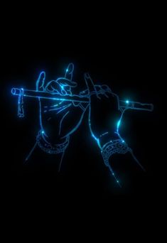 a hand holding a pipe with blue lights on it in front of a black background