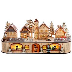 a wooden christmas village with lights and houses