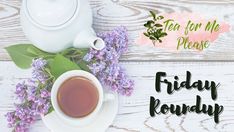 a cup of tea next to some purple flowers and a white teapot with the words friday roundup on it