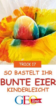 an orange and yellow flower with the words trick 17 so bastelt thr bunte eier kinderleigh