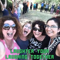 four women are posing for a photo with their wine glasses in front of them and the words laughter laughing together