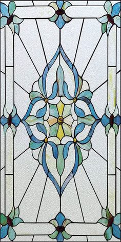 a stained glass window with blue and green designs