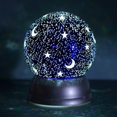 a night light with stars and moon on it