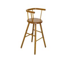 a wooden bar stool with an armrest and back rests against a white background,