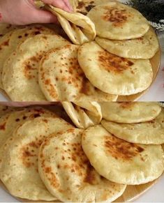 there is a white plate with some flat breads on it and someone holding a fork