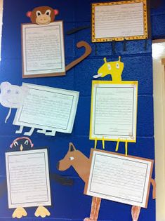 the bulletin board is decorated with animals and other things to write on it's side