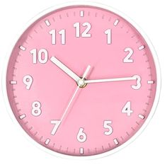 a pink clock with white numbers on the face is shown in front of a white background