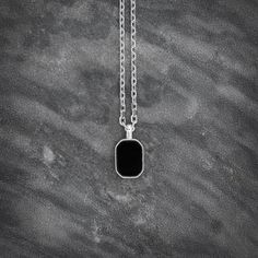 The Rounded-Corner Rectangle Pendant featuring a black onyx stone in a 925 silver bezel exudes understated elegance. Its sleek, polished design highlights the deep, captivating hue of the onyx, while the rounded edges add a contemporary touch. Small in size, this minimalistic pendant is perfect for layering or wearing solo, offering a versatile accessory for any occasion. DESIGNER'S REMARKS With its smooth, rounded-corner rectangle design, this black onyx pendant reflects a balance of modern sim Husband Gift Ideas, Black Onyx Pendant, Men Gift Ideas, Top Christmas Gifts, Father Gifts, Rectangle Pendant, Onyx Pendant, Gifts For Men And Women, Gift Bracelet