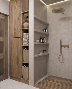 a bathroom with wooden shelves and white walls