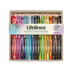 an assortment of colored pencils in a wooden box on a white background with the words lifelines written above it