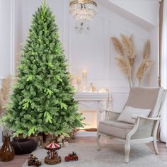 a living room with a christmas tree in the corner and toys on the floor next to it