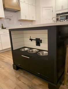 a kitchen with an oven built into the floor