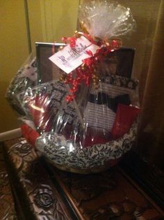 a basket filled with assorted items sitting on top of a table