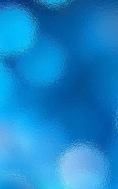 an abstract blue background with small circles