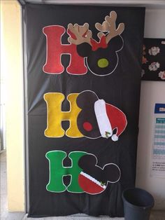 a door decorated with christmas decorations and the words ho ho ho