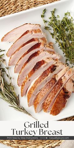 grilled turkey breast on a plate with herbs