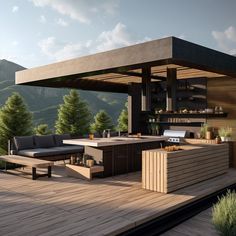 an outdoor kitchen and dining area on a deck